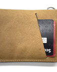CODA asymmetric wallet in 4oz leather with stainless-steel hardware, further detail view