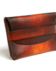 FLAP wallet in English bridle leather, 70's sunburst dye finish, back view