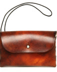 LINKED pouch in premium English bridle leather, woven gusset, 70's sunburst dye, front view