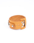 Gemini cuff studded in 8-9oz vegetable-tanned leather with stainless-steel hardware, further detail view