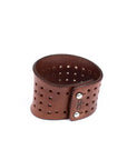 Contour perforated cuff medium brown in 8-9oz English bridle leather, leather texture detail