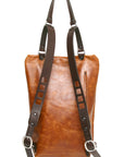 YETI leather sling pack in vintage tan, back view