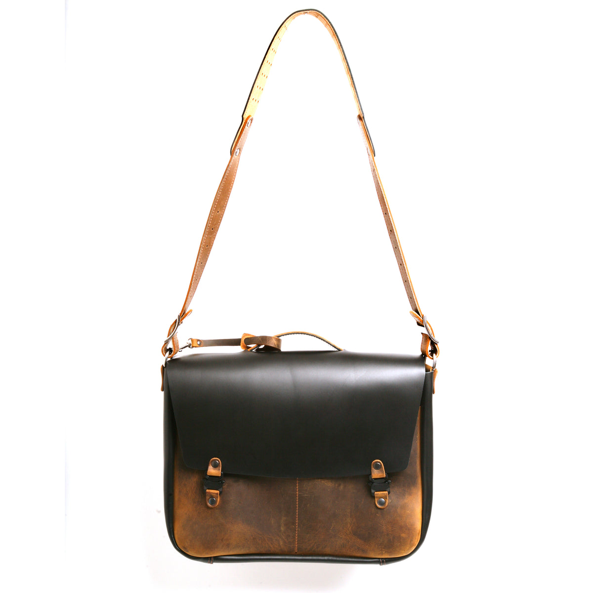 Bacula Messenger bag in full leather construction (structured black leather, pull-up and smooth finish), reinforced with military-grade quick-release buckles and gunmetal rivets at stress points, back view