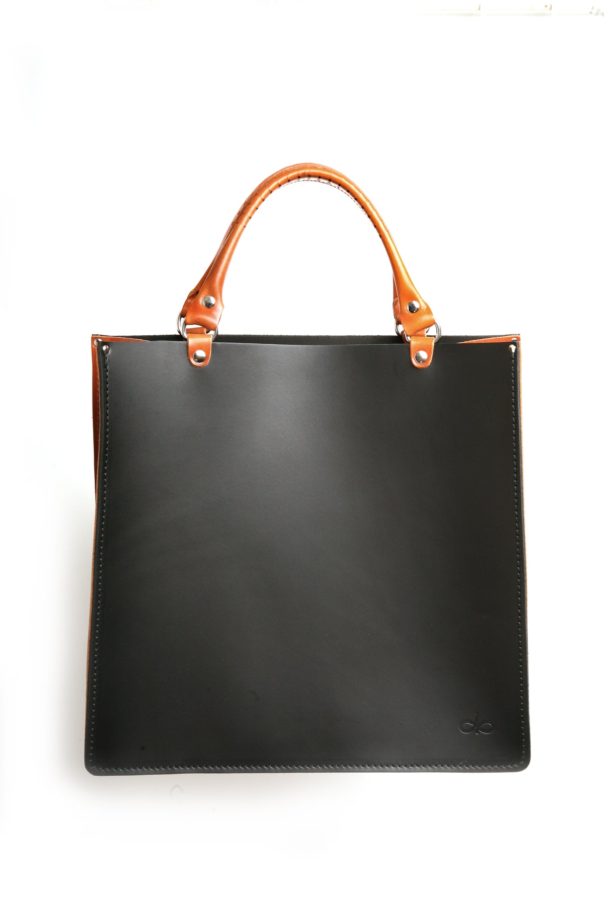 BOX tote bag in leather with solid stainless-steel hardware, front view