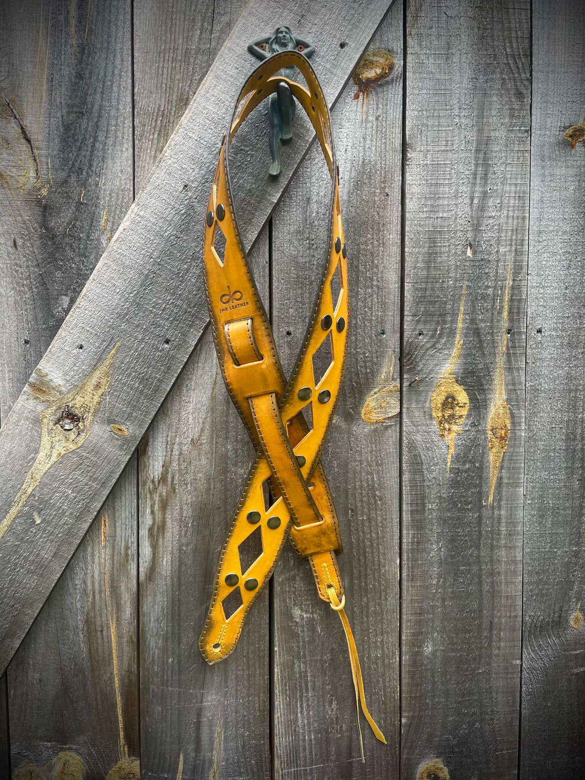 Vintage Guitar strap diamond stud Burnt Thistle in vegetable-tanned leather, burnished edges, laid flat, full length