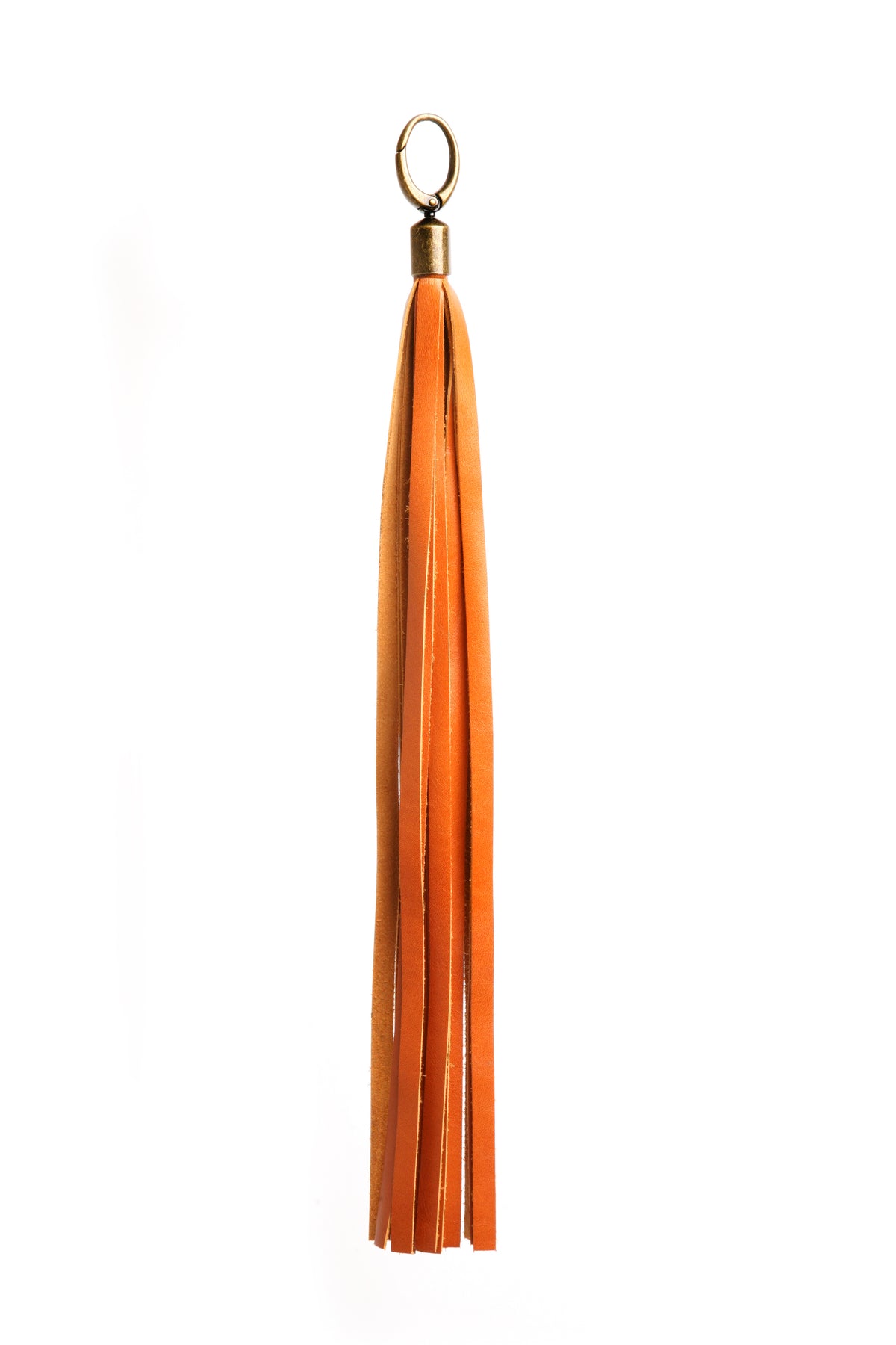 Long Tassel in premium leather construction, close-up detail
