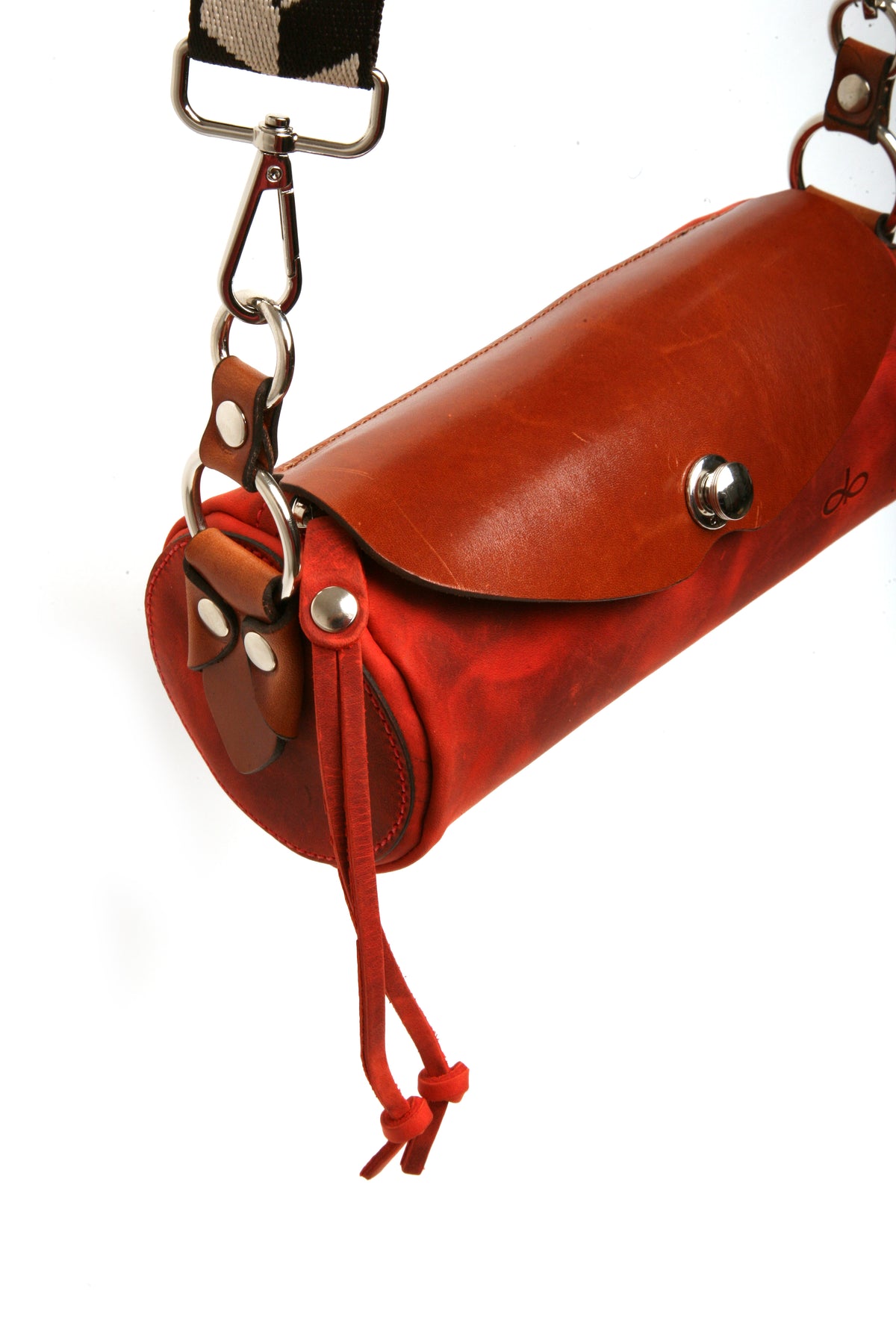 RUI roll bag in English bridle leather, side view