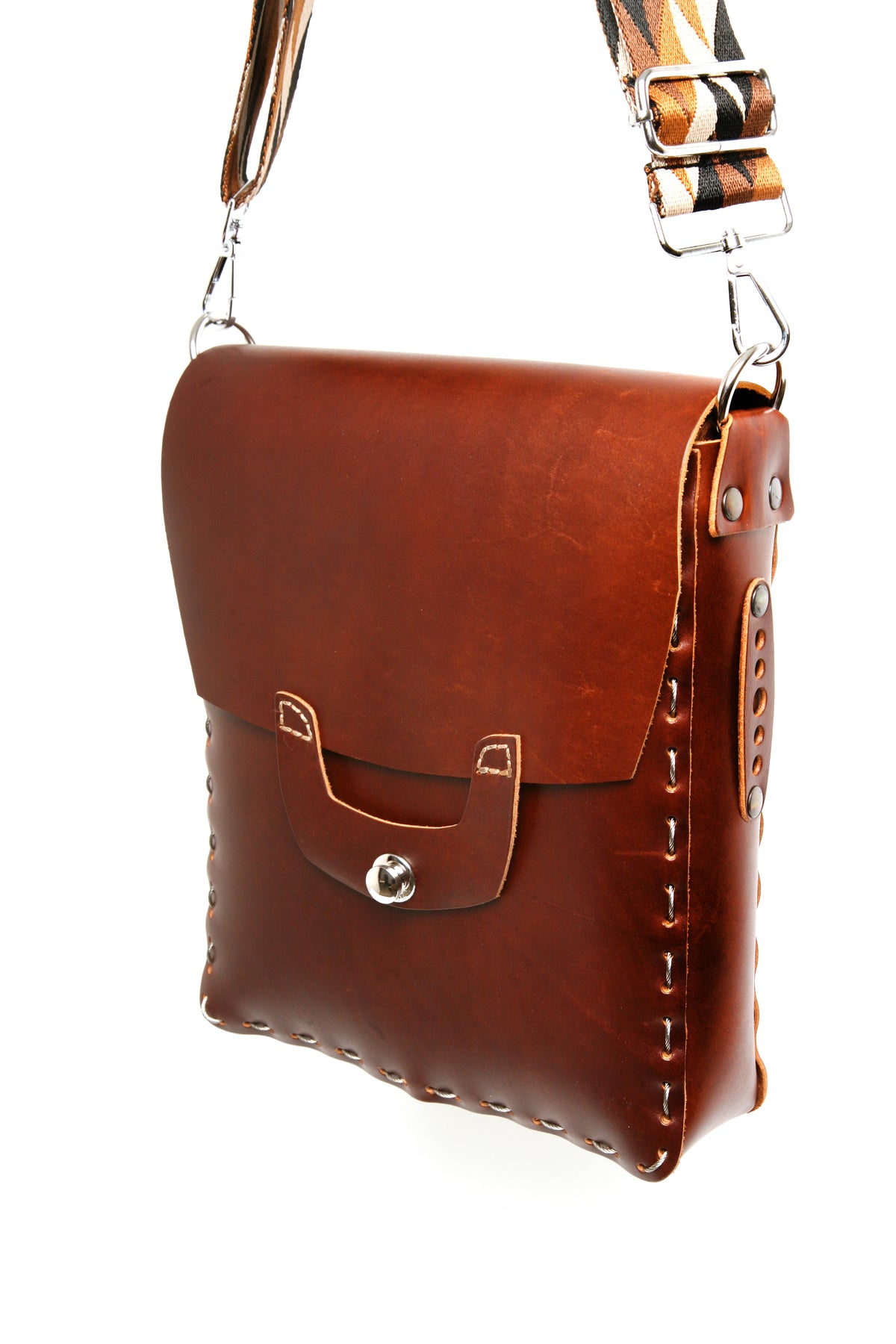 KEBURU satchel bag in top-grain leather, hand-stitched with stainless steel cable, side view