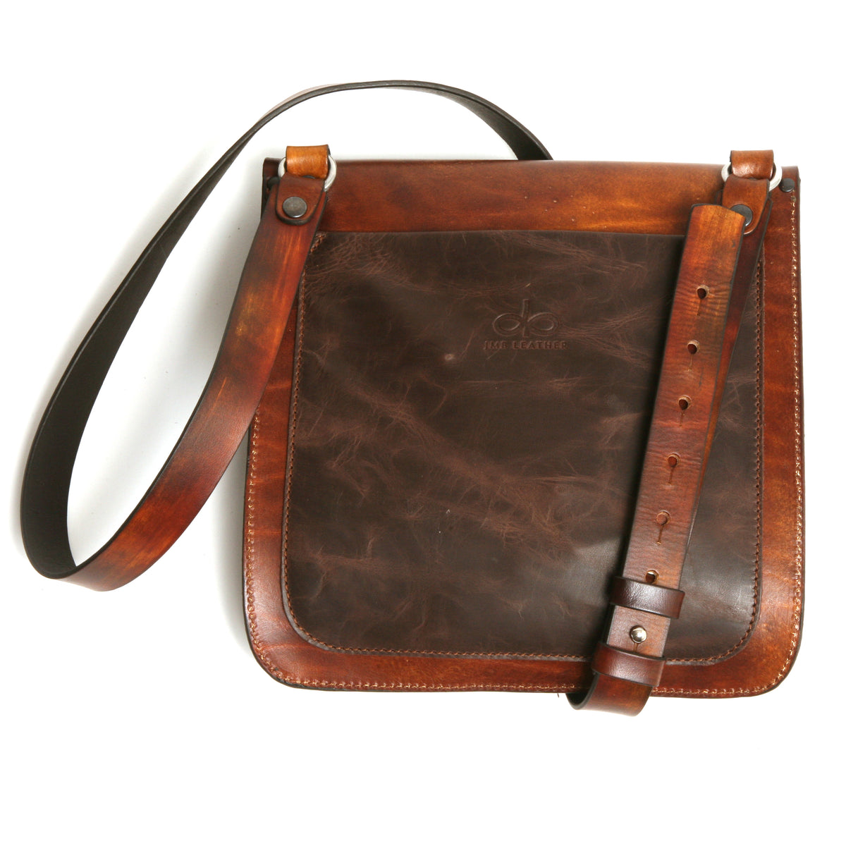 ROSCO satchel bag in vegetable-tanned leather (flap) with softer leather (main body), side view