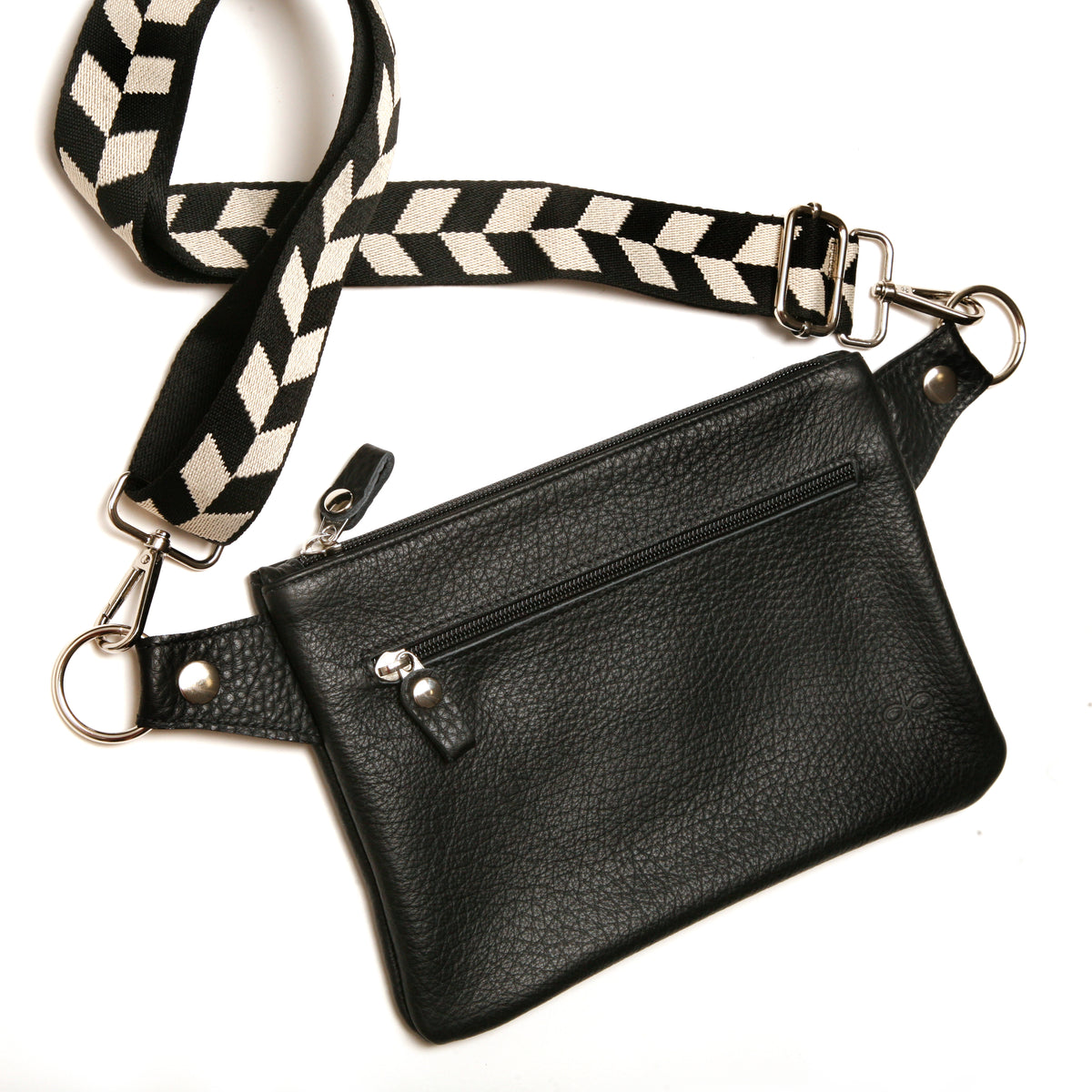 Flat Sling crossbody bag in leather with harness hardware, hardware detail