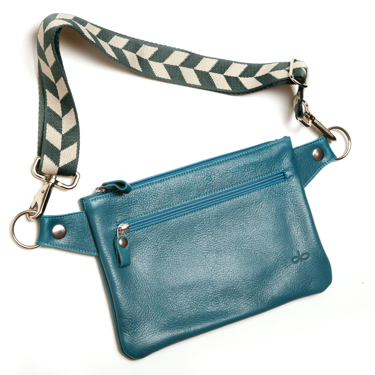Flat Sling crossbody bag in leather with harness hardware, strap detail