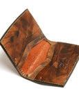 YANAGI wallet LTD edition perforated in vegetable-tanned leather, close-up detail