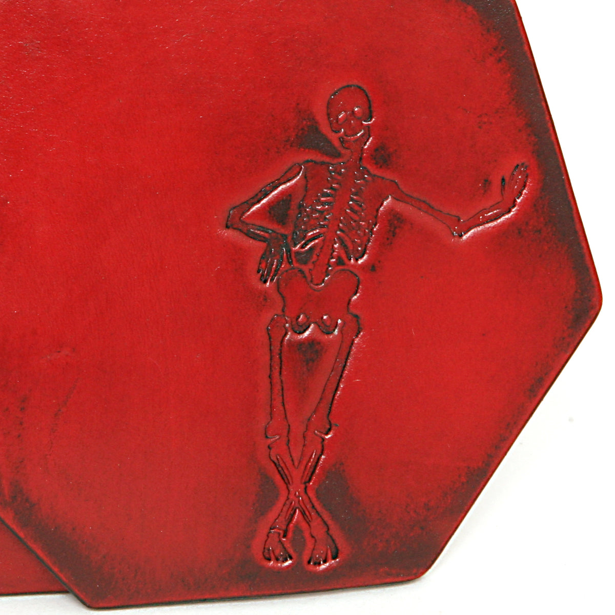 Skeleton Coasters 7 sided in 13oz English bridle leather, hand-burnished and painted edges, detail view