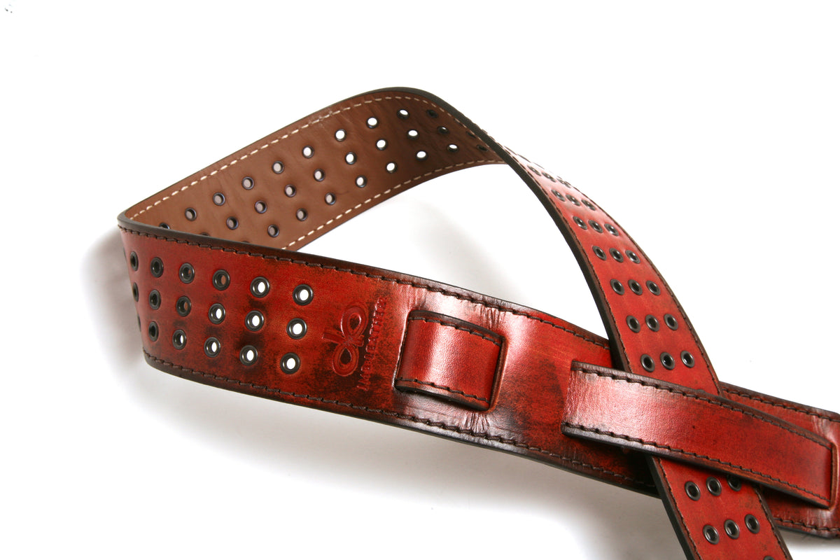 Vintage SG leather guitar strap in rust red, side view