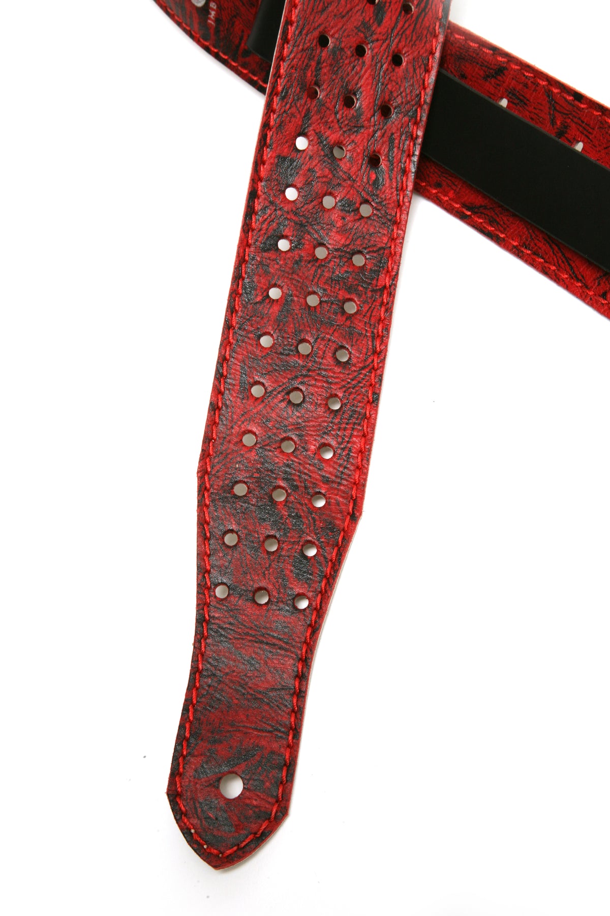 MADDOG Guitar strap in top-grain leather, antiqued finish, burnished edges, fully perforated, reverse side