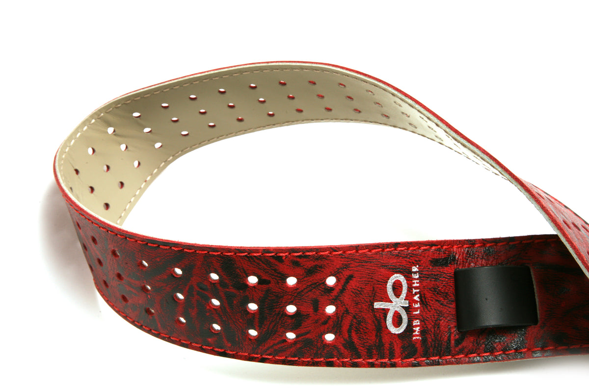 MADDOG Guitar strap in top-grain leather, antiqued finish, burnished edges, fully perforated with burnished edges, additional view