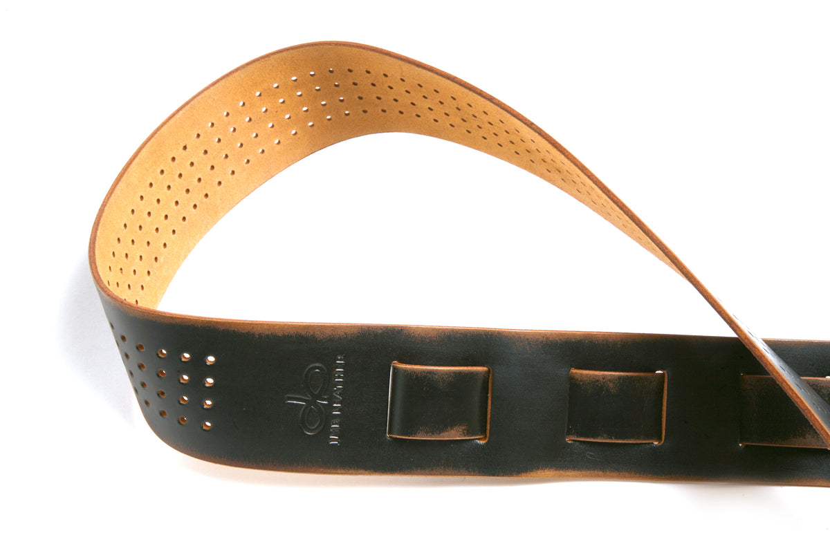 Vintage QP Guitar strap in full-grain leather, burnished edges, fully perforated, leather texture detail