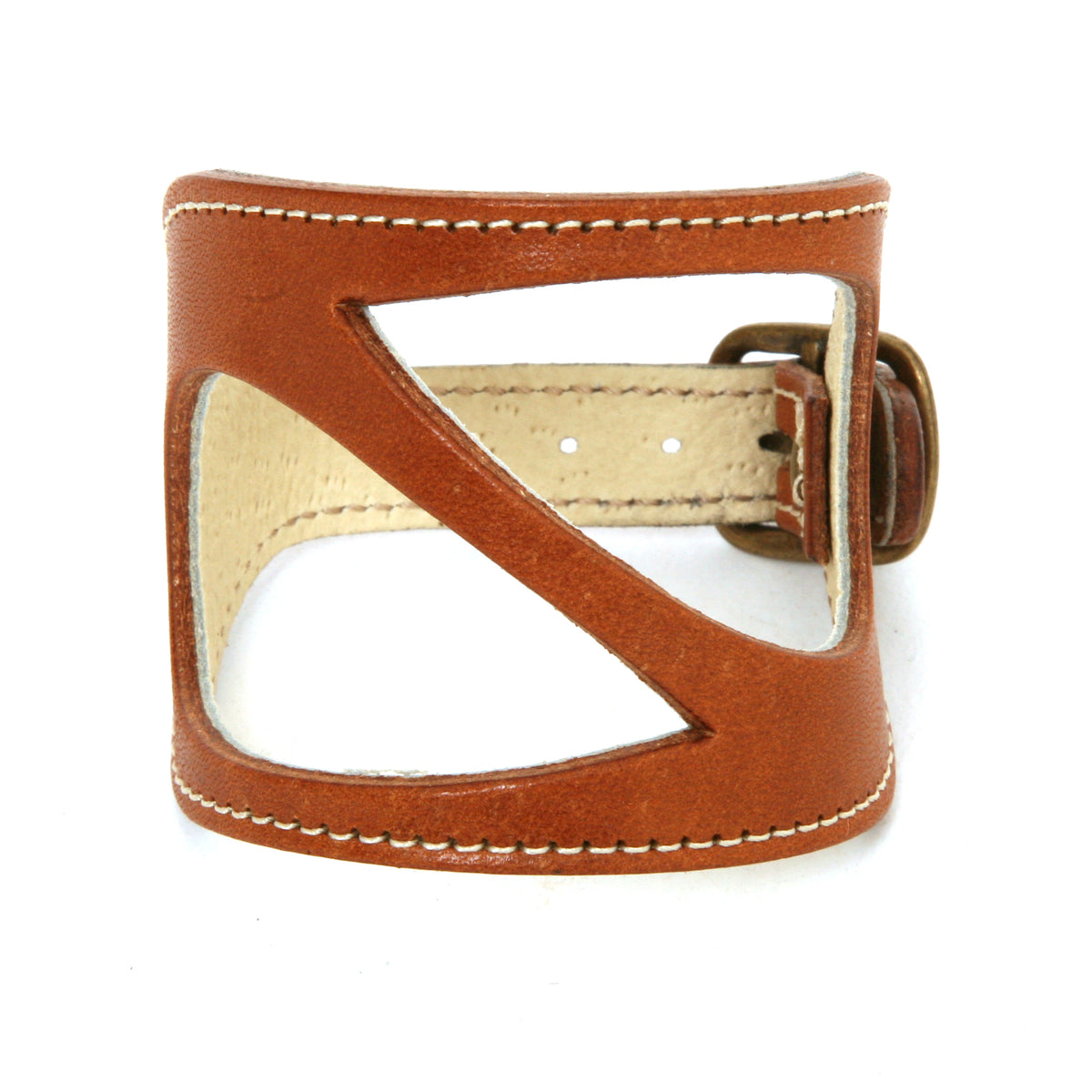 Wide Drop cuff in medium-weight premium leather (lighter weights lined; thicker vegetable-tanned weights unlined), leather texture detail