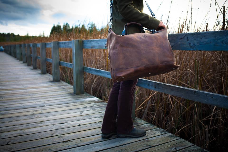 CARRY-ON Weekender LTD. edition bag in brown crazy horse leather with 10oz English bridle detailing, side view