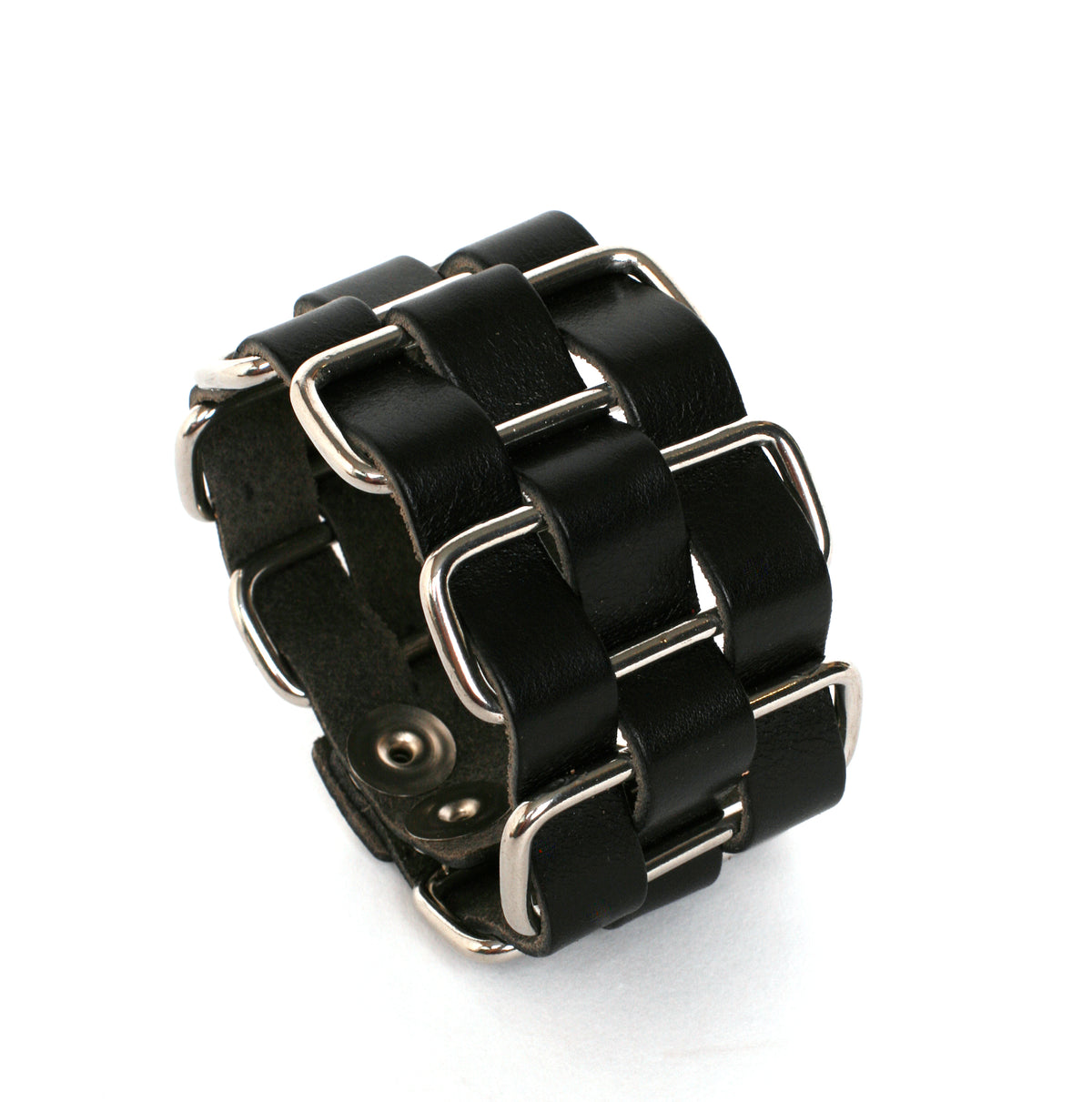 Cholo stainless-steel cuff in vegetable-tanned leather woven through welded solid stainless-steel loops, side view