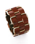 Cholo stainless-steel cuff in vegetable-tanned leather woven through welded solid stainless-steel loops, clasp detail