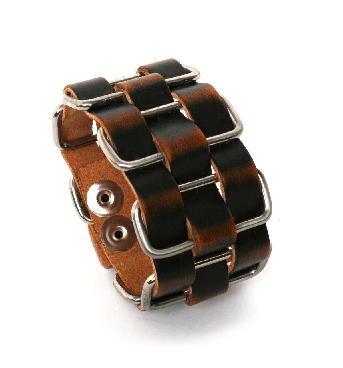Cholo stainless-steel cuff in vegetable-tanned leather woven through welded solid stainless-steel loops, front view