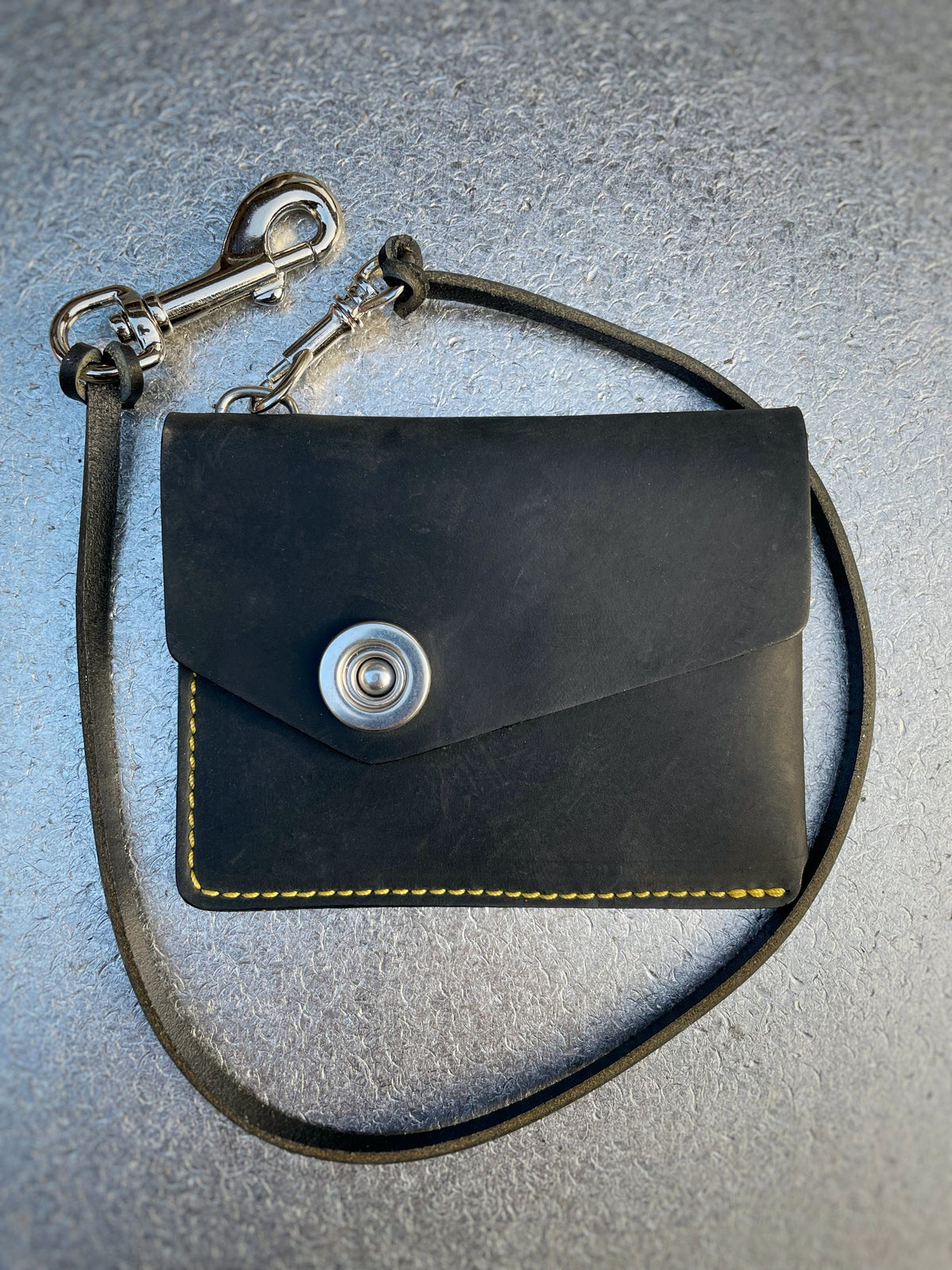 CODA asymmetric wallet in 4oz leather with stainless-steel hardware, alternate angle