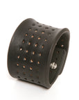 Contour perforated cuff medium brown in 8-9oz English bridle leather with stainless-steel hardware, further detail view