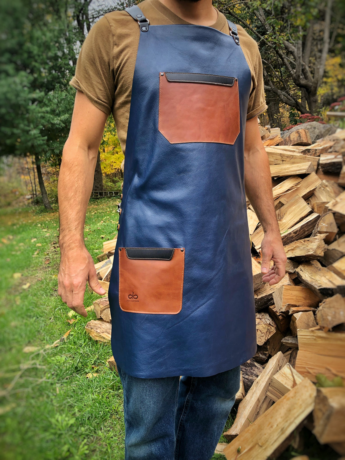 Leather Apron blue and tan in top-grain leather (single panel, no seams), back view