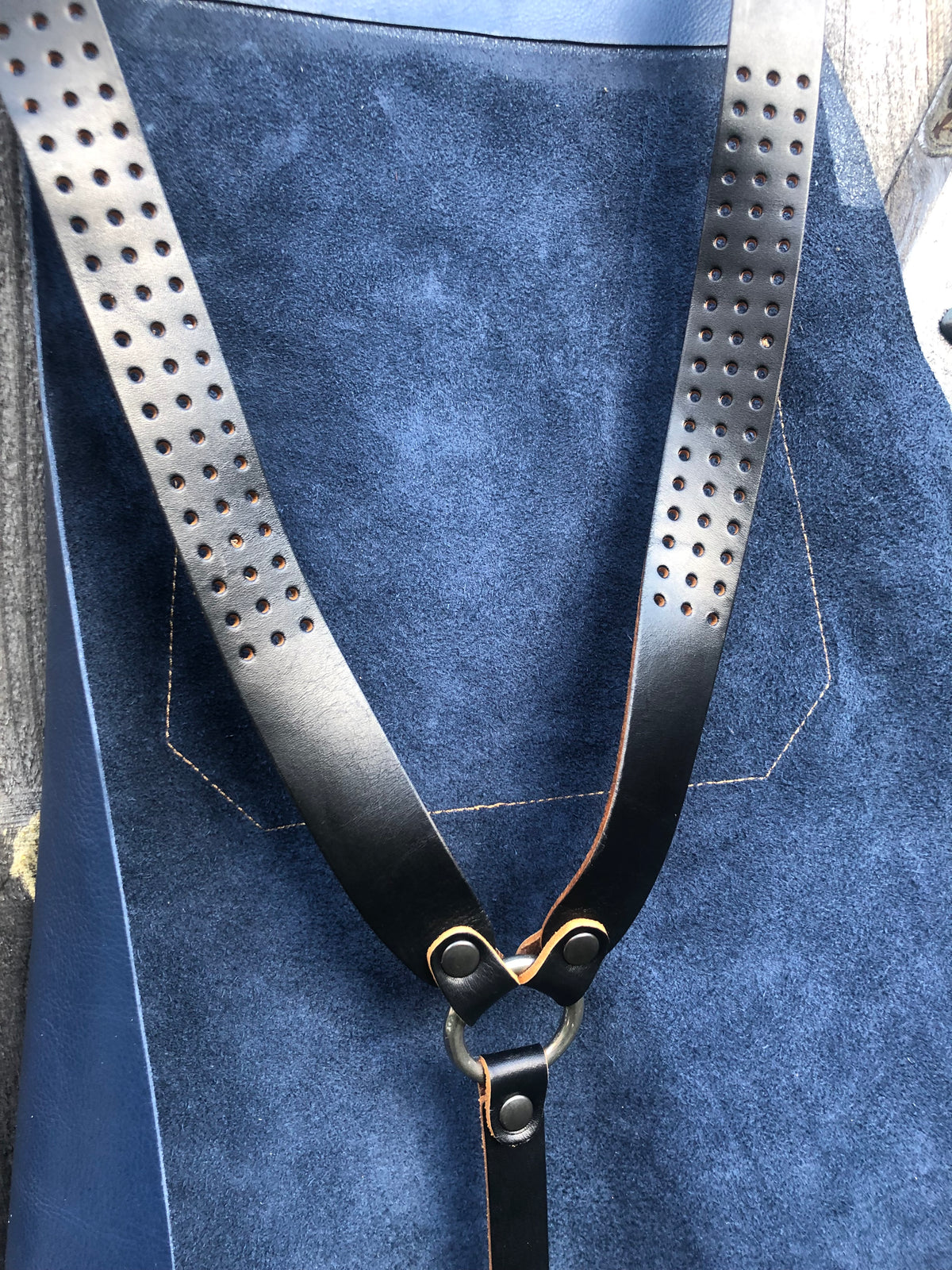 Leather Apron blue and tan in top-grain leather (single panel, no seams), detail view