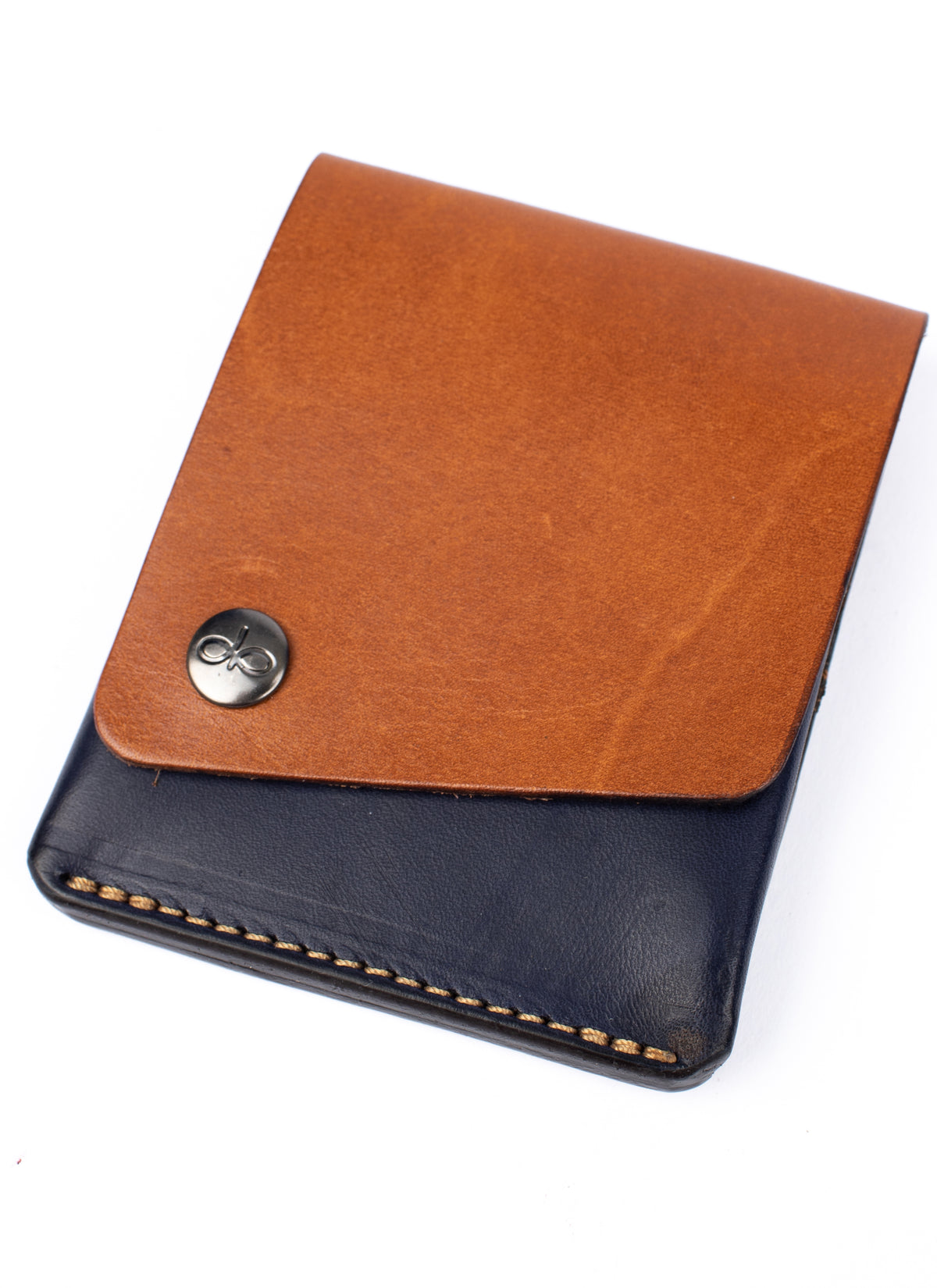 Piegato minimalist wallet tan & navy in leather, back view