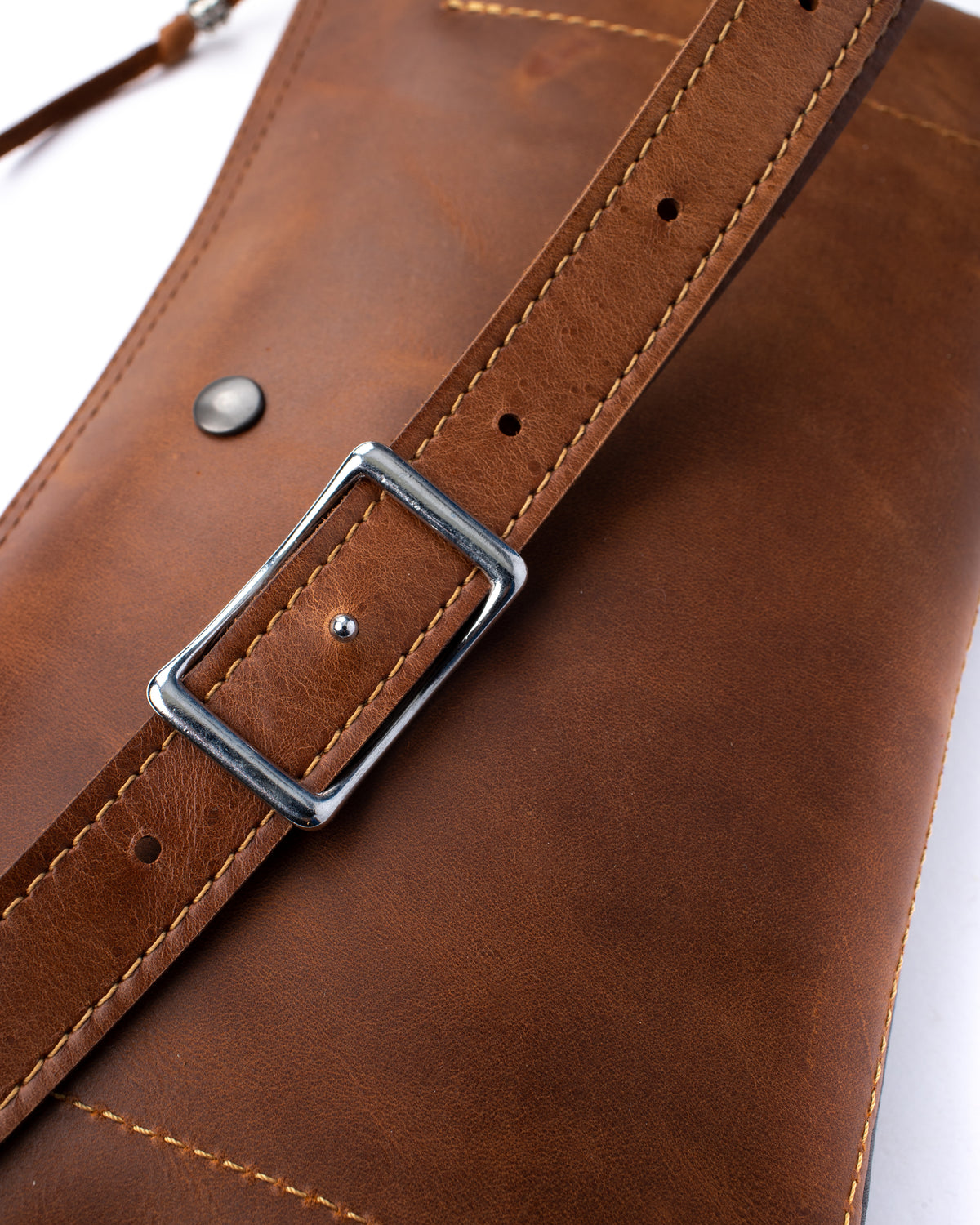 Ryker sling bag oiled 2 tone brown in full-grain leather, side view