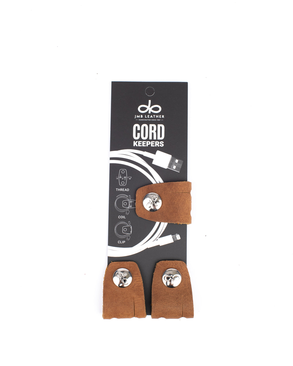 Cord Keepers in 100% full-grain leather with brass hardware, alternate angle