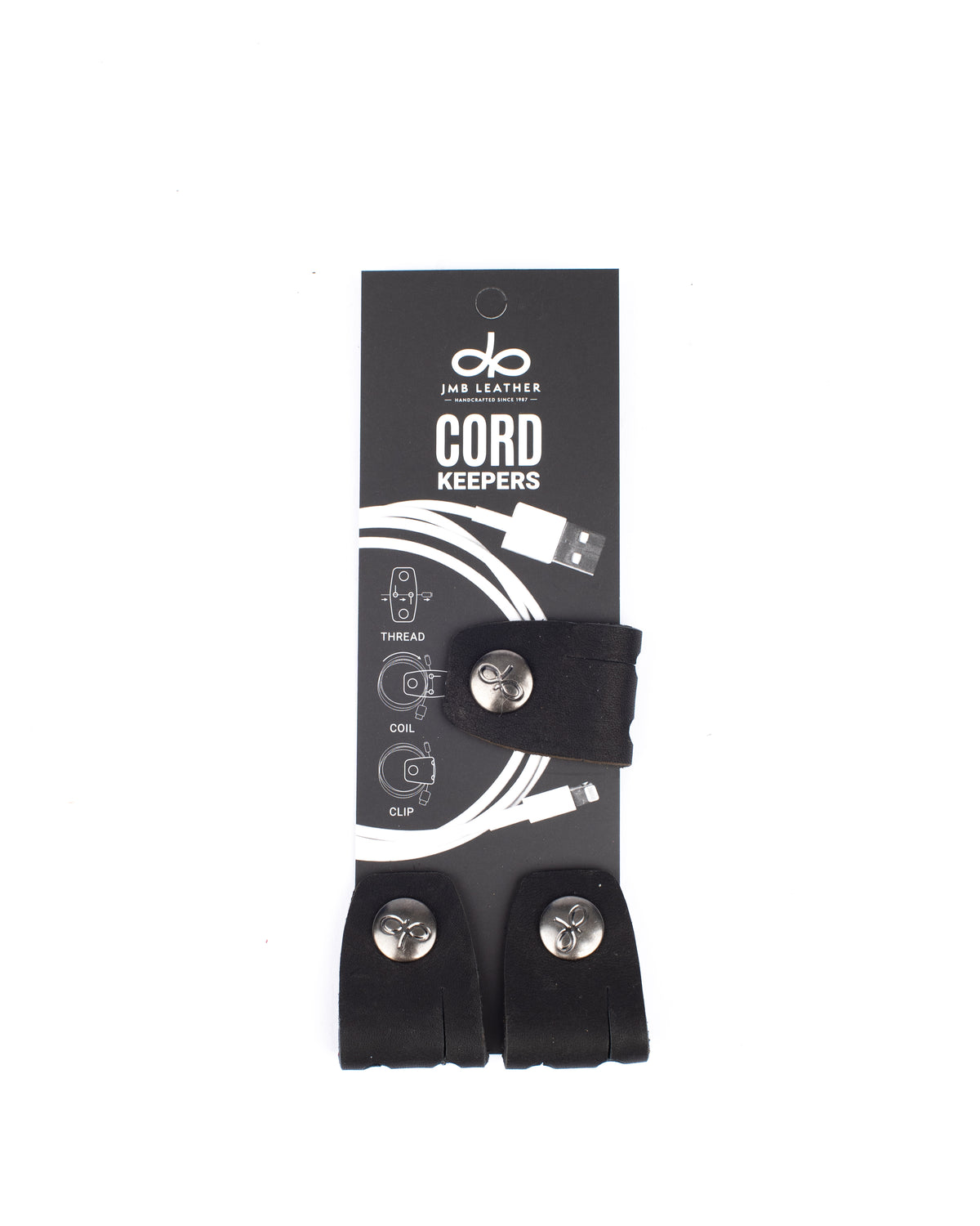 Cord Keepers in 100% full-grain leather with brass hardware, further detail view