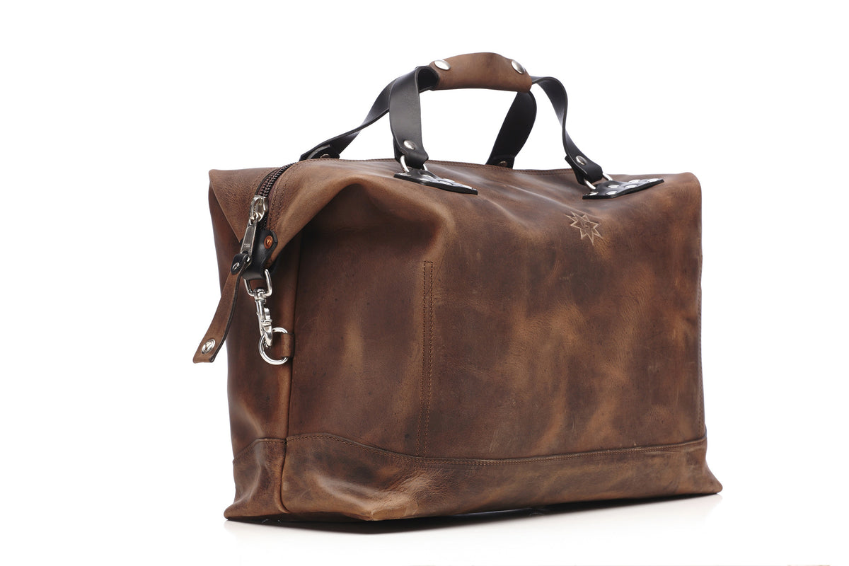 CARRY-ON Weekender LTD. edition bag in brown crazy horse leather with 10oz English bridle detailing, front view