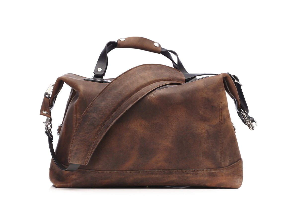 CARRY-ON Weekender LTD. edition bag in brown crazy horse leather with 10oz English bridle detailing, hardware detail