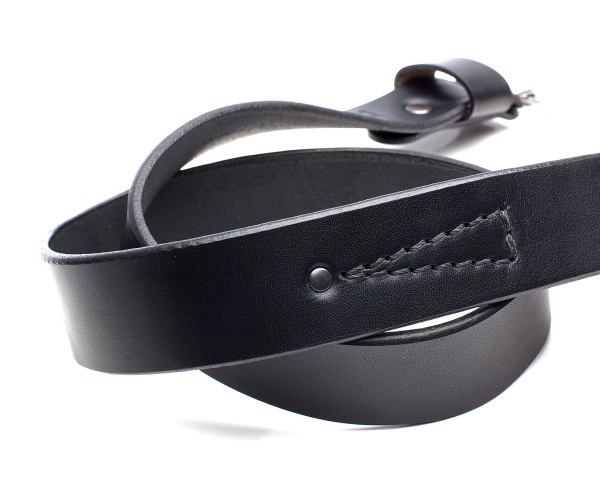 PLAYER belt in leather, heavy harness thread stitching, gunmetal rivet, leather grain and edge detail