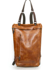 YETI leather sling pack in vintage tan, front view